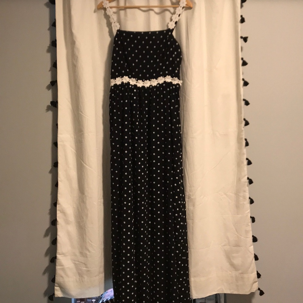 Black maxi dress with embroidered flowers